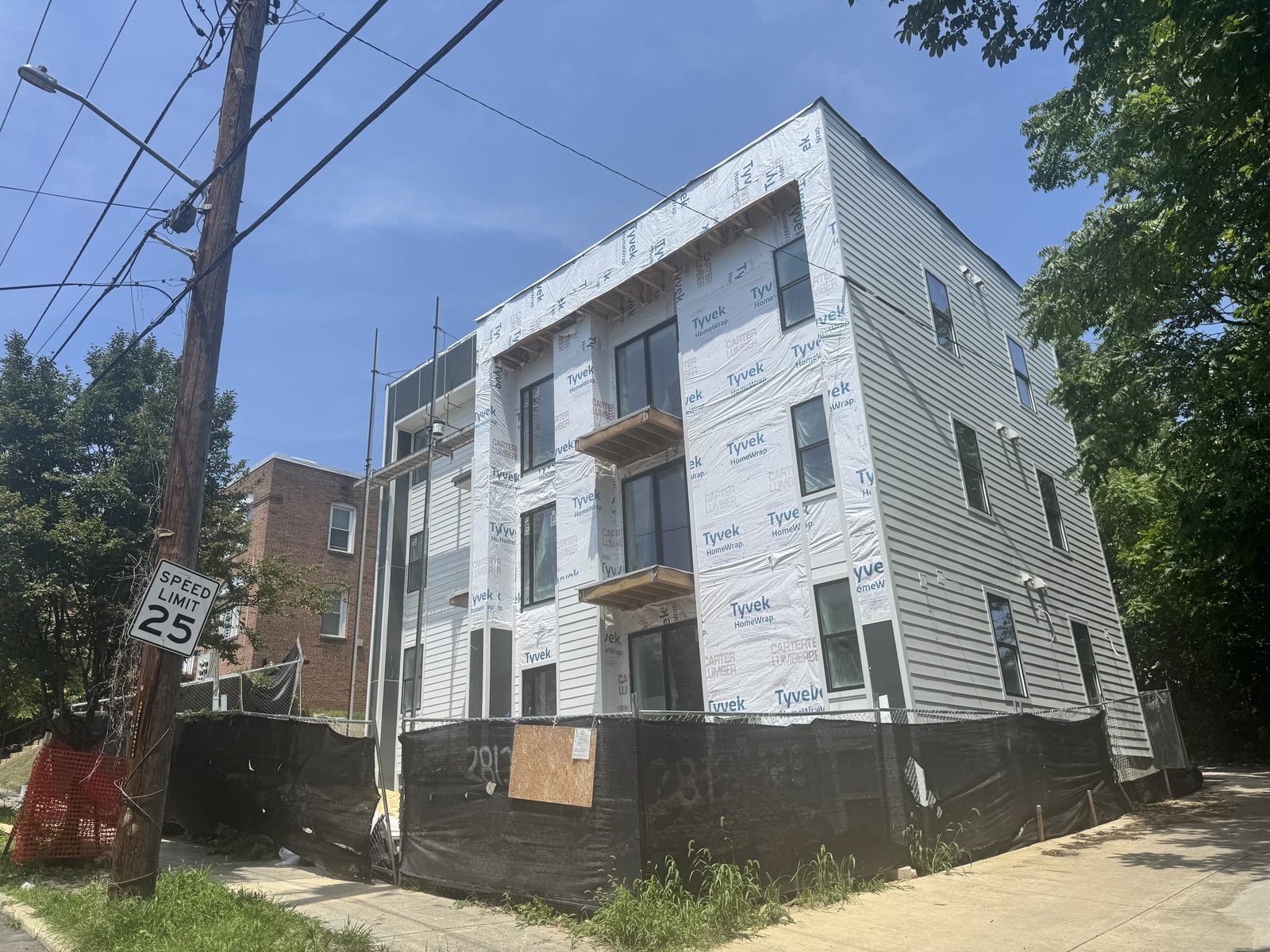 Exterior siding installation at Gainesville Apartments, 2812 Gainesville St SE